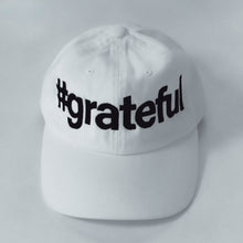 Load image into Gallery viewer, White cap with '#grateful' text on a light gray background
